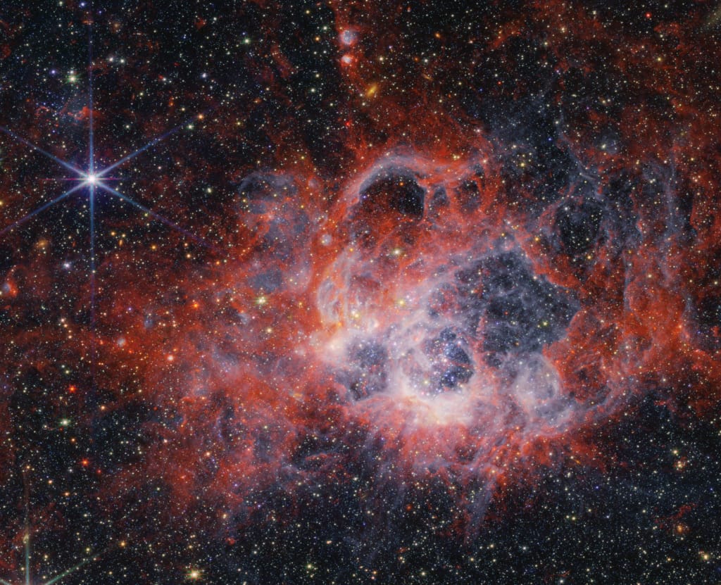 NGC 604: Giant Stellar Nursery NGC 604: Giant Stellar Nursery