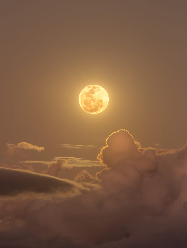 Clouds and the Golden Moon Clouds and the Golden Moon