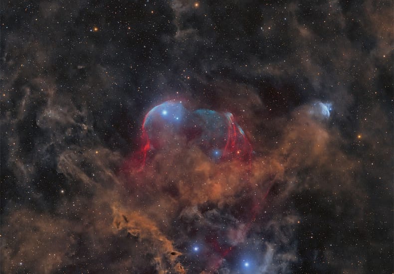 Between Scylla and Charybdis: A Double Cosmic Discovery Between Scylla and Charybdis: A Double Cosmic Discovery