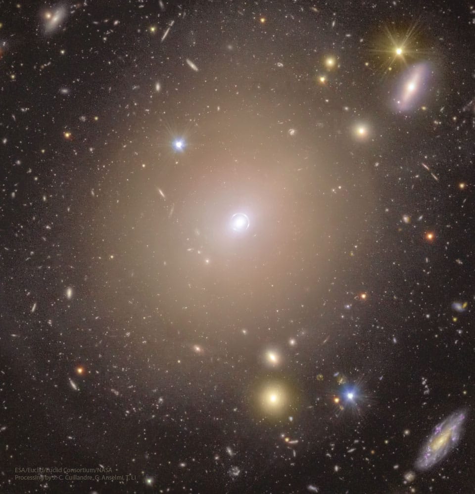 Einstein Ring Surrounds Nearby Galaxy Center Einstein Ring Surrounds Nearby Galaxy Center